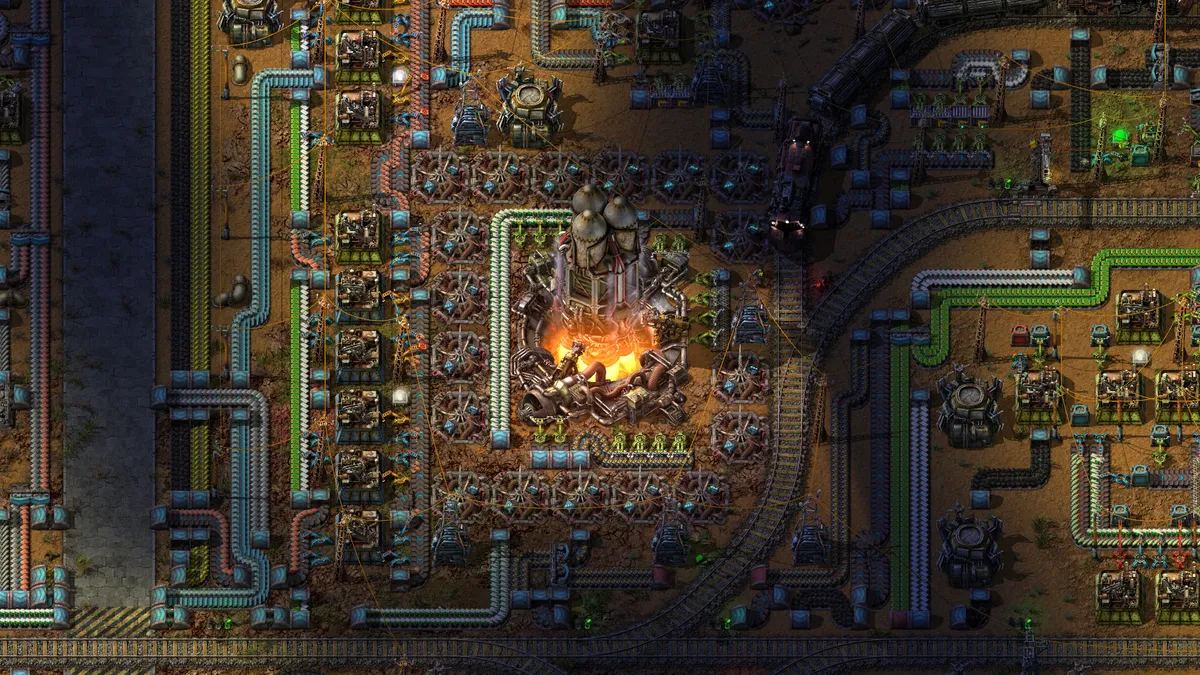 Factorioのベルトと組立機が並ぶ工場の画面